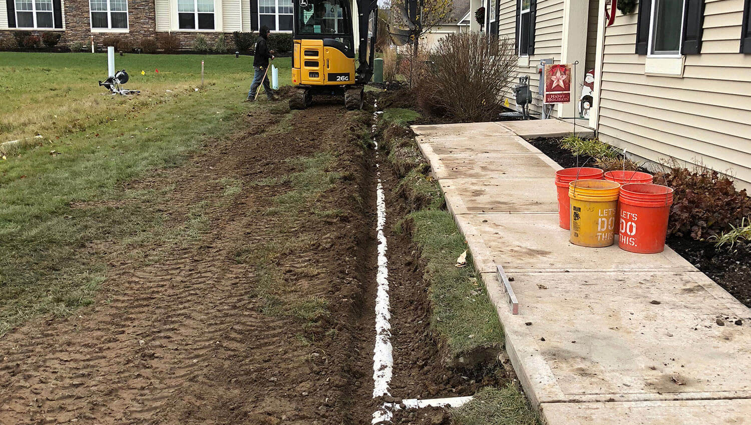 A drainage and grading installation at a Central New York Home