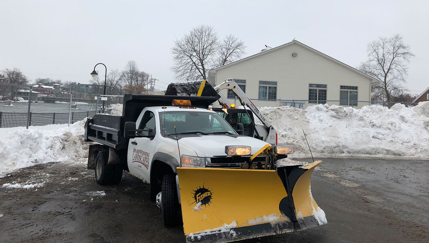 Commercial snow removal vehicles during a Central New york Winter