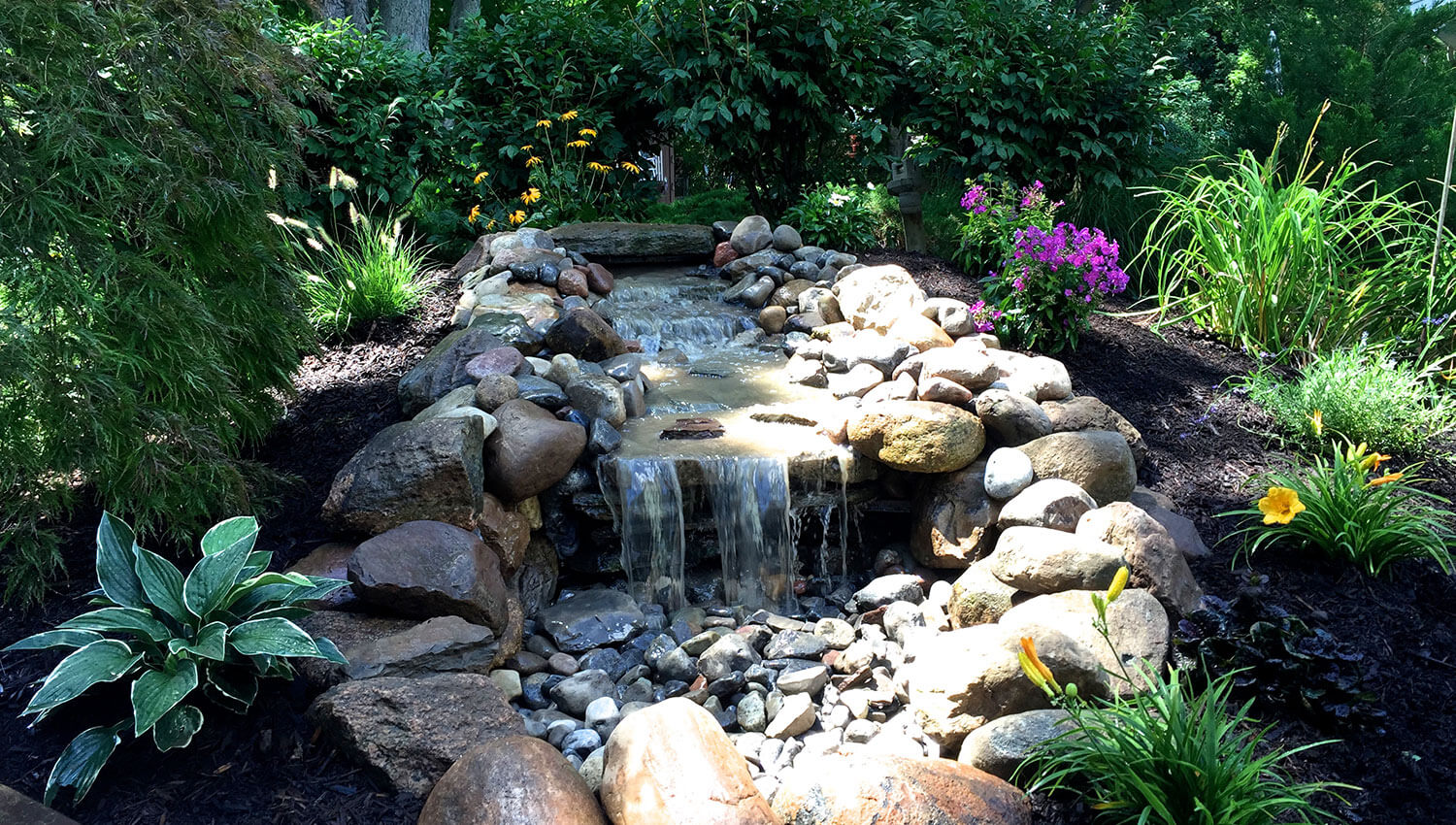 A beautiful waterfall designed for a Central New York Home